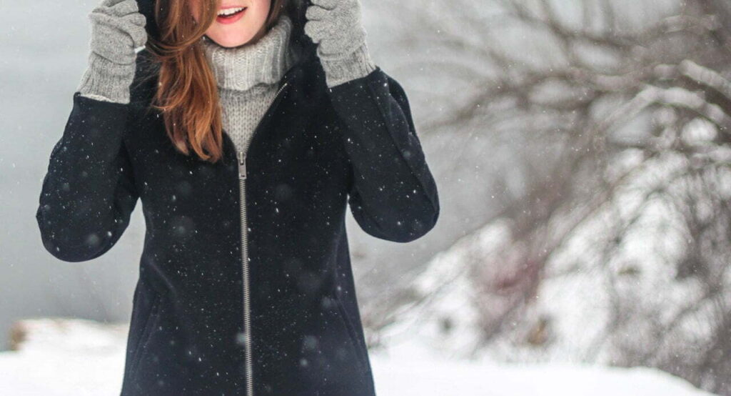 woman walking in winter snow