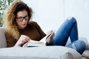 woman relaxing with a book
