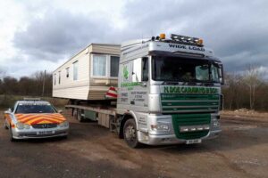 static caravan on transport lorry