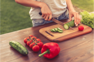 cutting vegetables outside