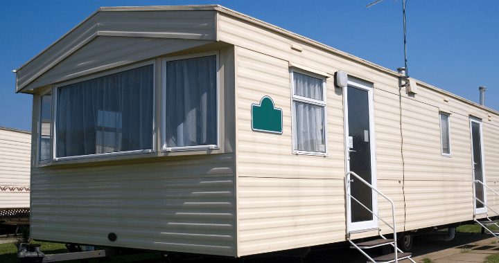 side view of white static caravan