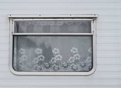 caravan window with net curtains