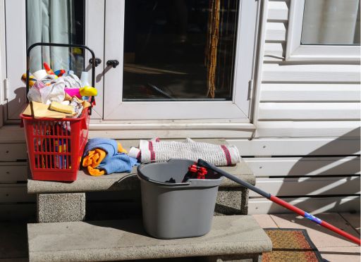 cleaning equipment outside a static caravan