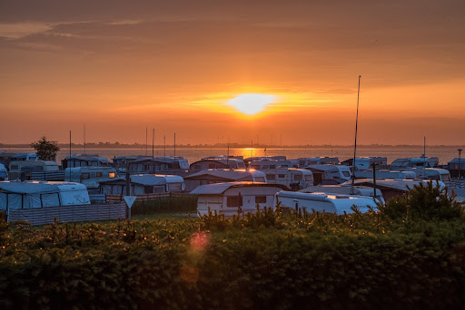 static caravans by the sea in the evening