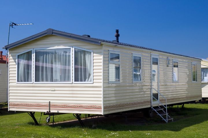 Static caravan in a field