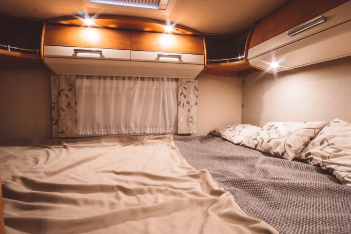 Static caravan bedroom with curtains pulled