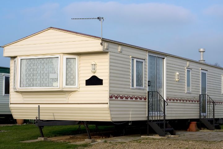 Static caravan in a field