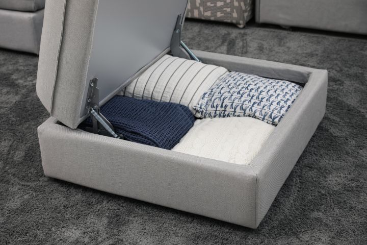 Storage footstool with blankets inside