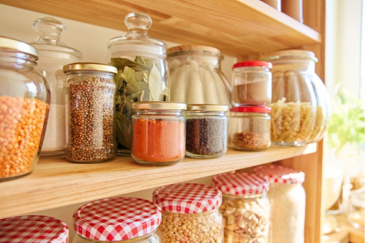 Kitchen storage jars with dry ingredients in