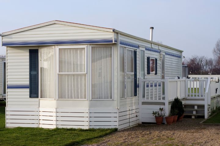 Static caravan with decking and planters