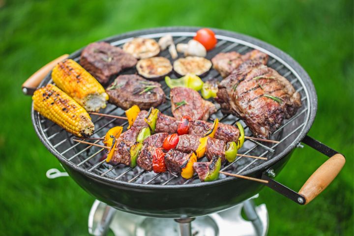 BBQ with meat and vegetables cooking