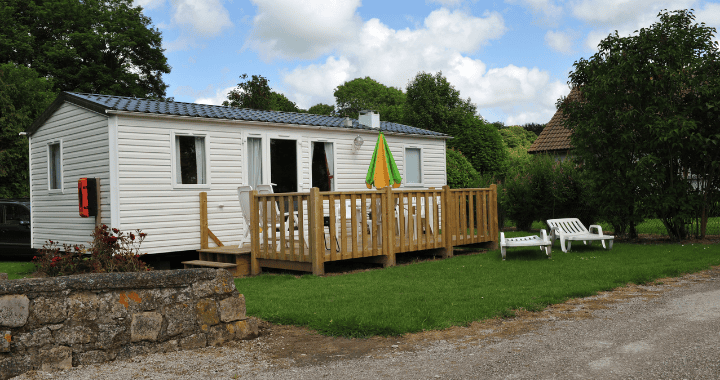 Static caravan outside of a house